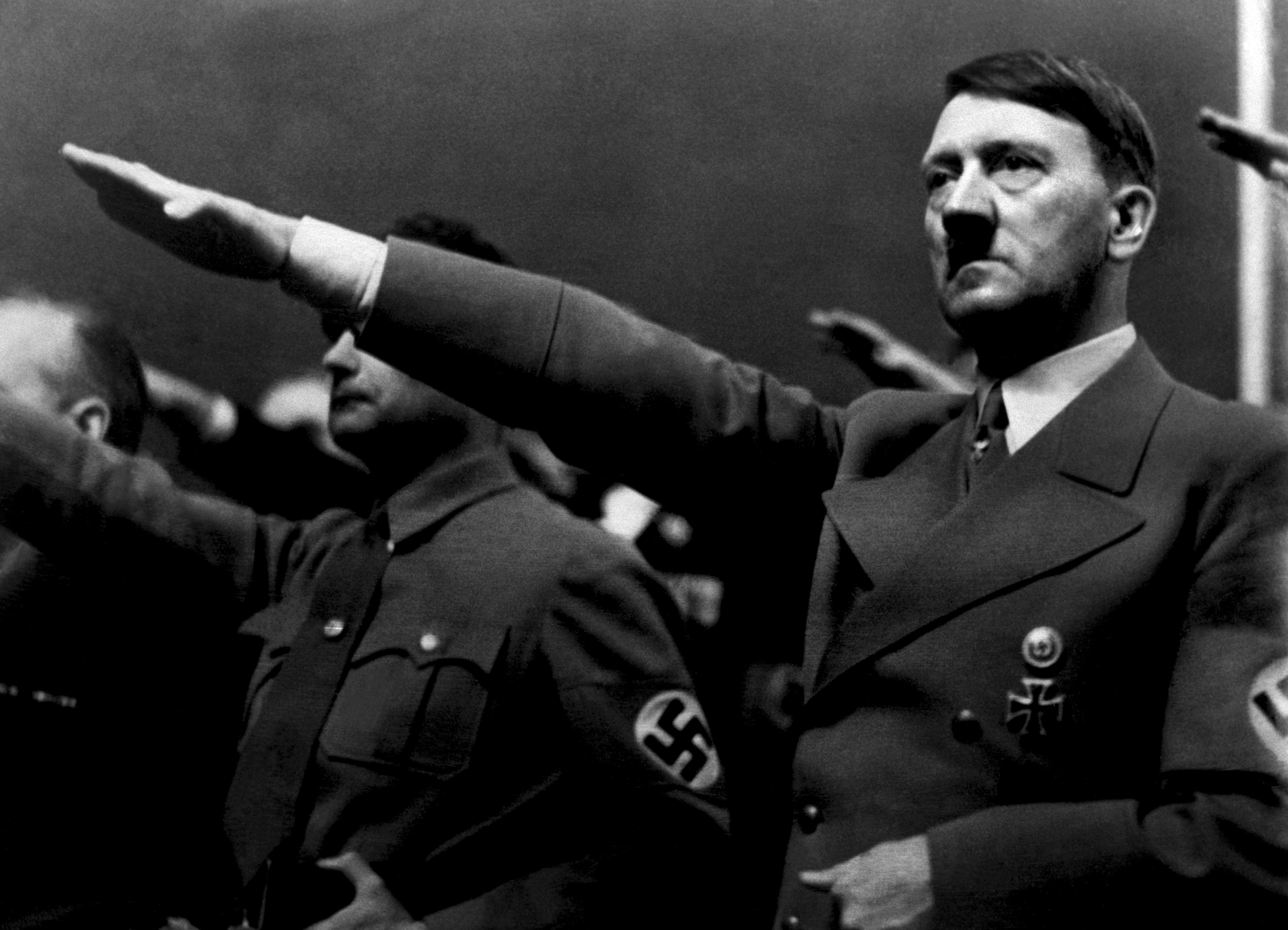 A picture dated 1939 shows German Nazi Chancellor Adolf Hitler giving the nazi salute during a rally next to Deputy Furhrer Rudolf Hess. 
