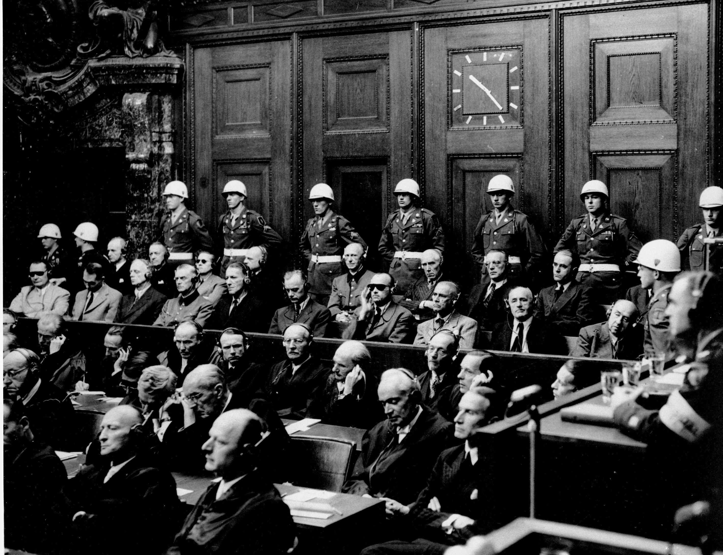 In this Sept. 30, 1946 b/w file picture defendants hear parts of the verdict in the Palace of Justice at the Nuremberg War Crimes Trial in Germany on Sept. 30, 1946