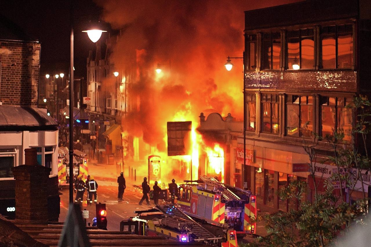 London riots: buildings burn on Tottenham High Road in 2011
